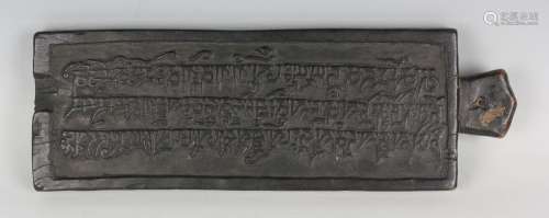 A Tibetan stained hardwood printing block