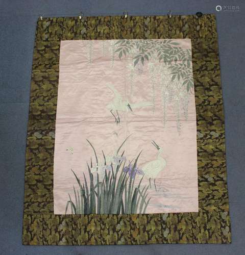 A Japanese silk embroidered rectangular wall hanging