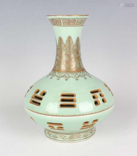 A Chinese gilt decorated pale green glazed porcelain two-sec...