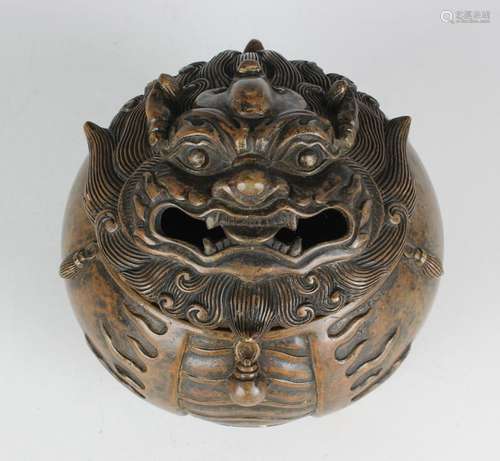 A Chinese brown patinated bronze zoomorphic censer and cover