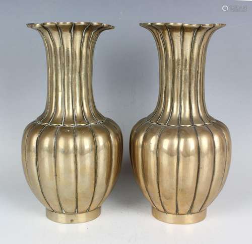 A pair of Chinese polished brass vases