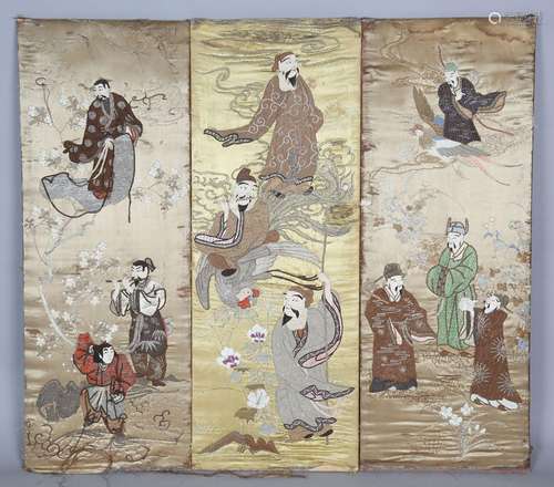 A group of three Japanese silk embroidered rectangular panel...