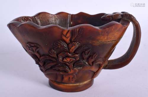 AN EARLY 20TH CENTURY CHINESE CARVED BUFFALO HORN LIBATION C...