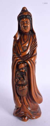 A 19TH CENTURY JAPANESE MEIJI PERIOD CARVED BOXWOOD FIGURE O...