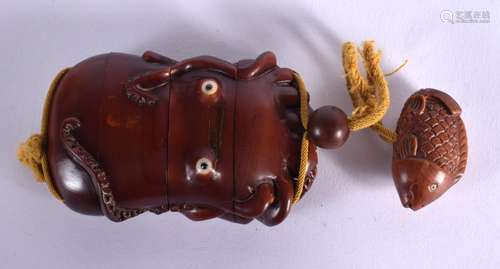 A JAPANESE CARVED BOXWOOD AND BONE OCTOPUS INRO. Inro 10 cm ...