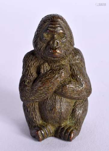 A JAPANESE BRONZE MONKEY OKIMONO. 6 cm x 2 cm.