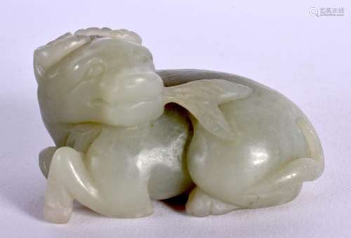 AN EARLY 20TH CENTURY CHINESE CARVED GREEN JADE BULLOCK Late...