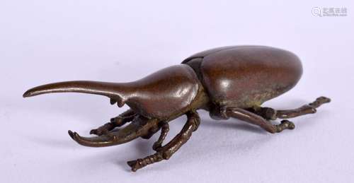 A JAPANESE BRONZE STAG BETTLE. 8 cm x 3 cm.