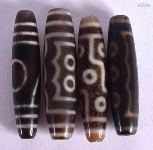 FOUR CHINESE AGATE ZHU BEADS 20th Century. 6 cm x 1.5 cm. (4...