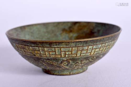 A CHINESE BRONZE BOWL 20th Century. 6 cm diameter.