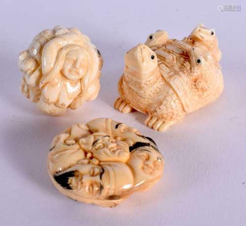 TWO JAPANESE CARVED BONE NETSUKES together with a similar to...