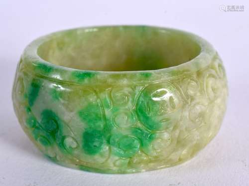 A CHINESE CARVED JADEITE CHILDS BANGLE 20th Century. 4.5 cm ...