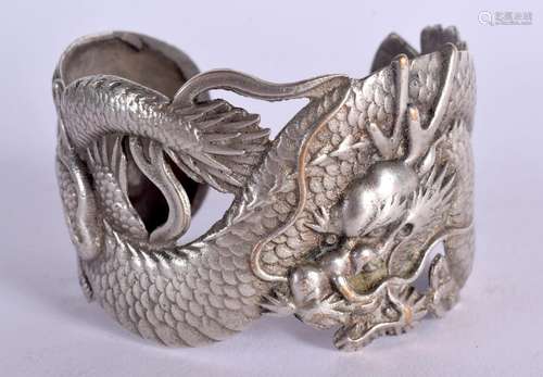 A JAPANESE TAISHO PERIOD WHITE METAL DRAGON BANGLE. 7.25 cm ...