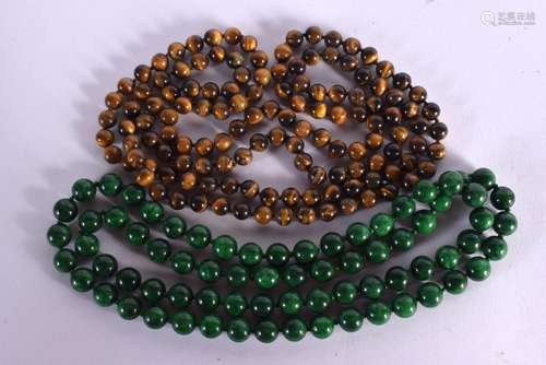 TWO CHINESE JADE AND TIGERS EYE NECKLACES 20th Century. Larg...