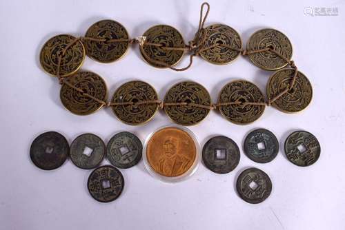 A STRING OF CHINESE BRONZE COINS 20th Century, together with...