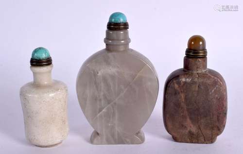 THREE CHINESE CARVED HARDSTONE SNUFF BOTTLES 20th Century. L...