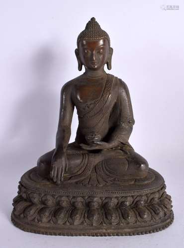 A CHINESE TIBETAN BRONZE FIGURE OF A BUDDHA 20th Century. 22...