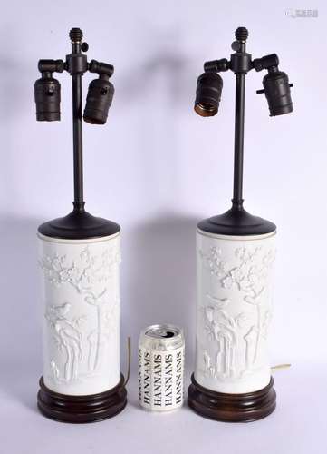 A PAIR OF 19TH CENTURY CHINESE BLANC DE CHINE PORCELAIN CYLI...