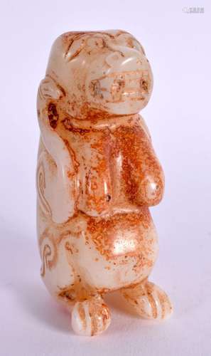 A CHINESE JADE FIGURE OF A BEAST 20th Century. 9.25 cm high.