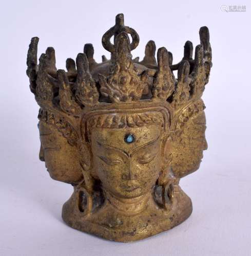 A 19TH CENTURY CHINESE TIBETAN BRONZE AND TURQUOISE BUDDHIST...