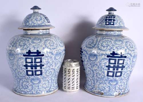 A PAIR OF CHINESE BLUE AND WHITE GINGER JARS AND COVERS 20th...