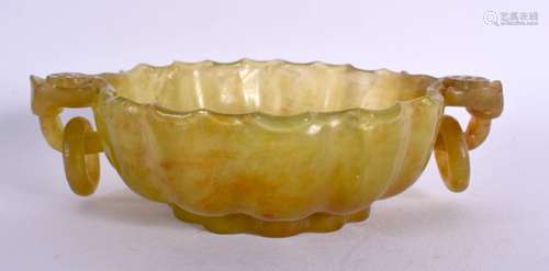 A 19TH CENTURY CHINESE TWIN HANDLED CHALCEDONY JADE TYPE LIB...