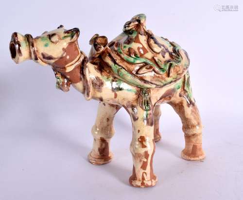 A TURKISH MIDDLE EASTERN CANAKKALE POTTERY CAMEL. 18 cm x 16...