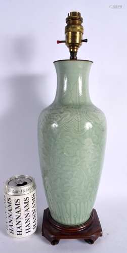 A 19TH CENTURY CHINESE CELADON PORCELAIN LAMP Qing, decorate...