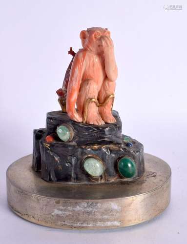 AN EARLY 20TH CENTURY CHINESE CORAL JADE AND SILVER FIGURE O...