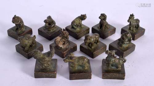 TWELVE CHINESE BRONZE SEALS 20th Century. 3 cm square. (12)