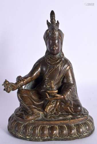 AN 18TH/19TH CENTURY CHINESE TIBETAN BRONZE FIGURE OF A SEAT...