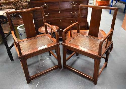 A PAIR OF EARLY 20TH CENTURY CHINESE CARVED HARDWOOD CHAIRS ...