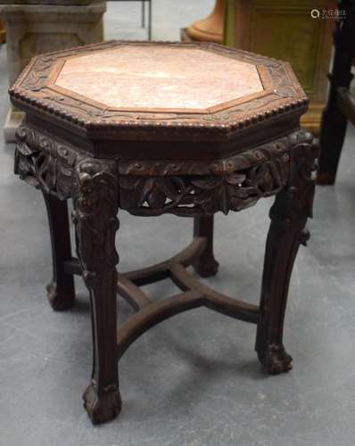 A 19TH CENTURY CHINESE CARVED HARDWOOD MARBLE INSET STAND Qi...