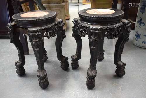 A PAIR OF 19TH CENTURY CHINESE HARDWOOD MARBLE INSET STANDS....