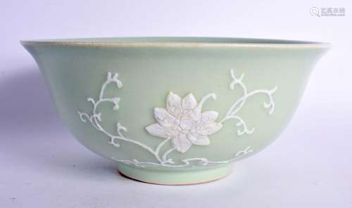 A LARGE CHINESE CELADON WHITE ENAMEL OVERLAID BOWL bearing Q...