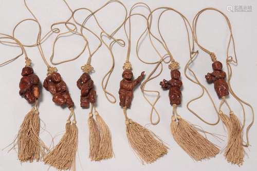 Six Chinese Carved Wooden Toggles,