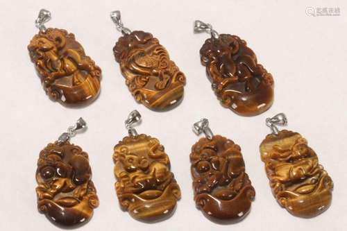 Seven Chinese Tigers Eye Pendants,