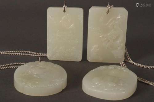 Four Jade Pendants with Sterling Silver Chains,