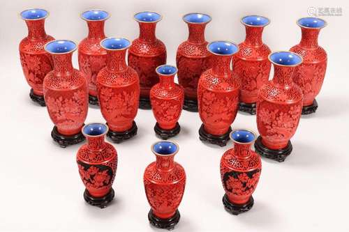 Ten Chinese Cinnabar Coloured Vases,