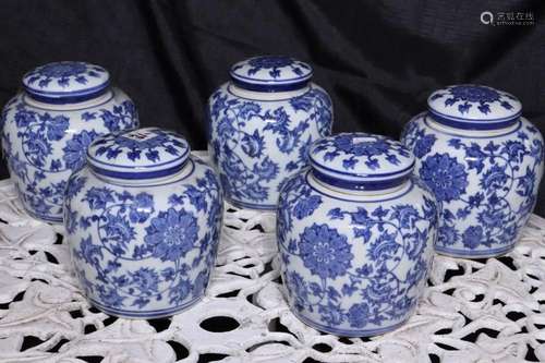 Set of Five Chinese Blue and White Jars and Covers