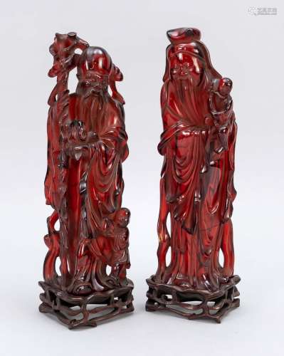 Wine-red bakelite figures, China, 2