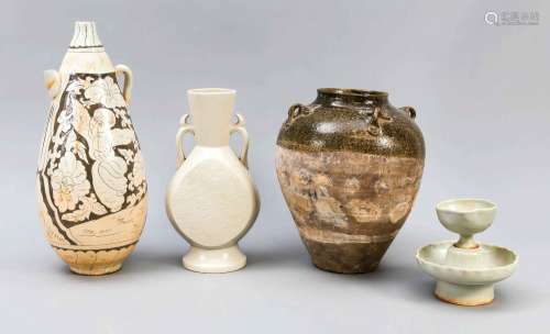 4 pieces of pottery in the style of