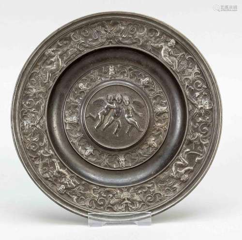 Iron plate with relief decoration