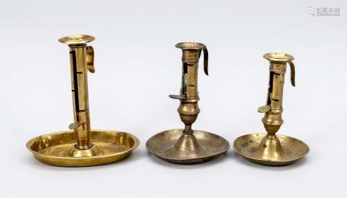 Three one-handed candlesticks with