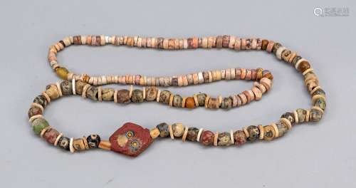 Necklace of glass and stone beads,