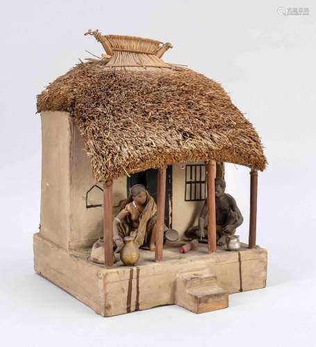 Model of a house with inhabitants,