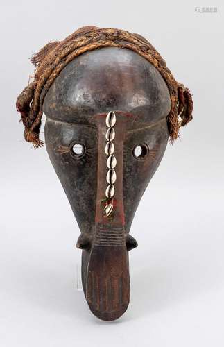 African cult mask in the shape of