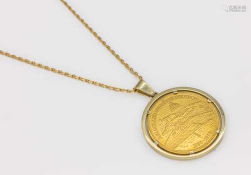 14 kt gold pendant with gold medal