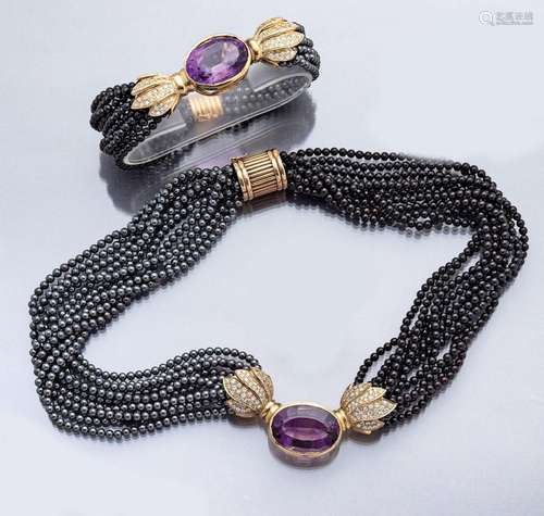 14 kt gold jewelry set with amethyst and brilliants