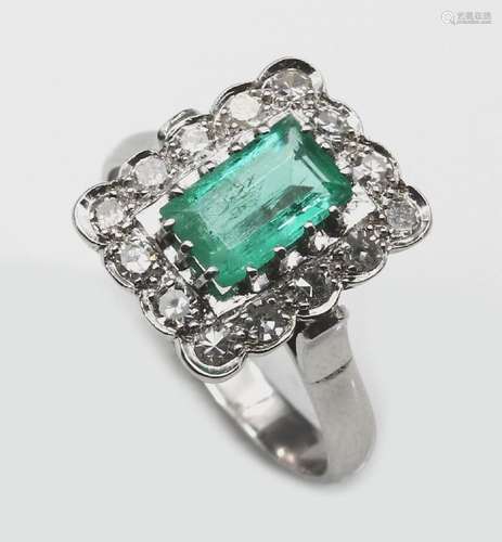 Ring with emerald and diamonds